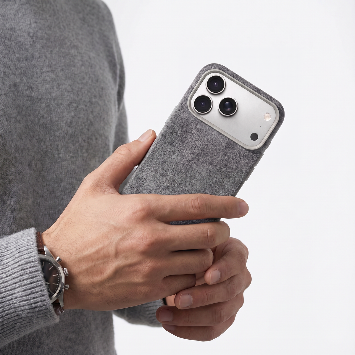 Nardo Gray Alcantara case for iPhone 18 Pro held in hands #iPhone model:_iPhone 18 Pro|iPhone 18 Pro Max